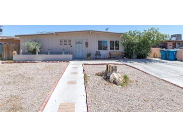 Charming single-story home featuring desert landscaping, a tidy yard, and a classic facade at 3212 Osage Ave, Las Vegas, NV 89101