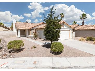 Charming single-story home with well-maintained front yard and desert landscaping at 317 Brent Ct, Henderson, NV 89074