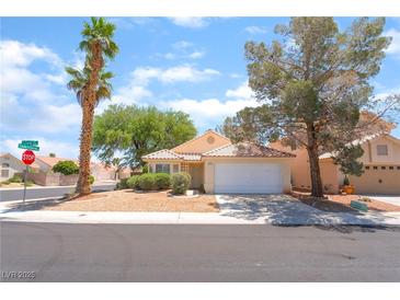 Charming single-story home features a two car garage and lush, desert-friendly landscaping at 4516 Cielo Ln, Las Vegas, NV 89130