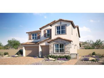 Charming two-story home with stone accents, two-car garage, tile roof, and a beautifully landscaped front yard at 769 Cloud Creek St, Henderson, NV 89011