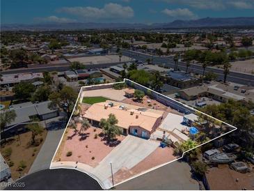 Spacious home on a large lot with mature landscaping in a desirable neighborhood; perfect for entertaining and relaxing outdoors at 2821 Moon Cir, Las Vegas, NV 89120
