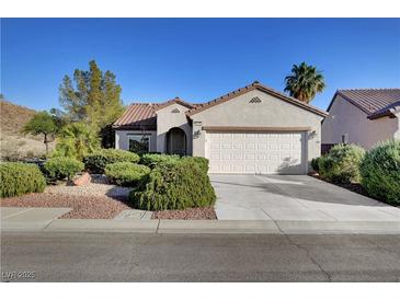 Charming single story home featuring desert landscaping and a two car garage at 2150 Maple Heights Ct, Henderson, NV 89052