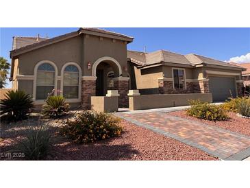 Charming single-story home featuring a tile roof and desert landscaping at 5005 Wild Thyme Ave, Las Vegas, NV 89131