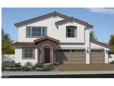 Stunning two-story home with a stylish archway entrance and three-car garage at 7708 Serenity Bay Ln # Lot 135, North Las Vegas, NV 89084