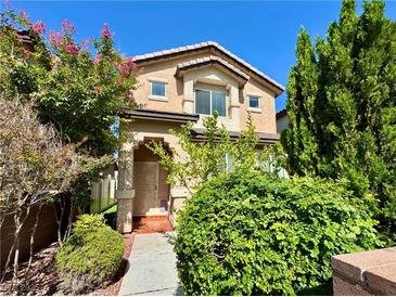 Charming two-story home with desert landscaping in a well-maintained community at 248 Crystal Rose Ct, Las Vegas, NV 89106