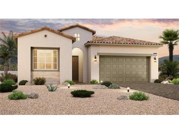 Inviting single-story home with a tile roof, a neutral color scheme, and desert landscaping at 81 Ibiza Lake Dr, Henderson, NV 89011