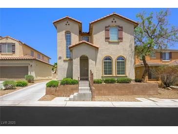 Charming two-story home with a well-manicured front yard and neutral stucco exterior at 9146 Grand Sunburst Ct, Las Vegas, NV 89149