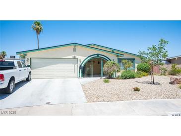 Charming single-story home featuring a two-car garage and well-maintained front yard with desert landscaping at 3484 Anthony Dr, Las Vegas, NV 89121