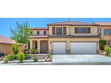 Two-story stucco house with a tile roof, brown shutters, and a two-car garage and landscaped front yard at 7619 Comanche Canyon Ave, Las Vegas, NV 89113