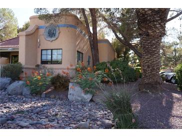 Charming exterior featuring a well-maintained building with beautiful plants and flowers at 2851 S Valley View Blvd # 1134, Las Vegas, NV 89102