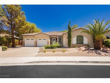 Charming single-story home with desert landscaping, three-car garage, and a bright, inviting facade at 4493 Rometta Ave, Las Vegas, NV 89141