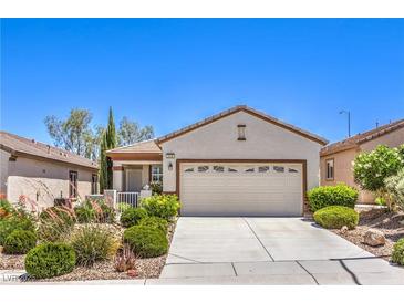 Charming single-story home with desert landscaping and a two-car garage at 2540 Binary Stars St, Henderson, NV 89044