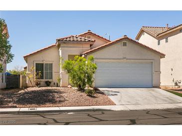 Charming single-story home with a two-car garage and well-maintained front yard at 4439 Scarlet Sea Ave, North Las Vegas, NV 89031