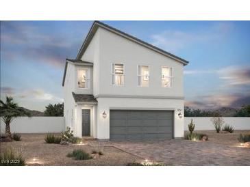 Modern two-story home with clean lines, desert landscaping, and a two-car garage at 8154 Rockflower St, Las Vegas, NV 89113