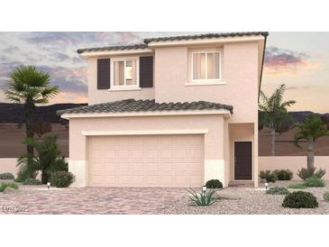 Charming two-story home showcasing a two-car garage and tasteful landscaping at 8526 W Agate Ave, Las Vegas, NV 89113