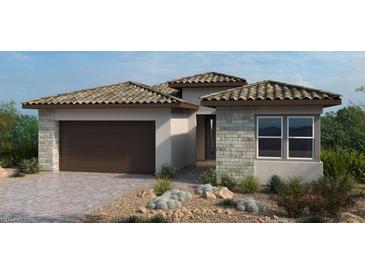 Stylish single-story home featuring a tile roof, stone accents, desert landscaping, and a two-car garage at 214 Piazzetta Pl, Henderson, NV 89011