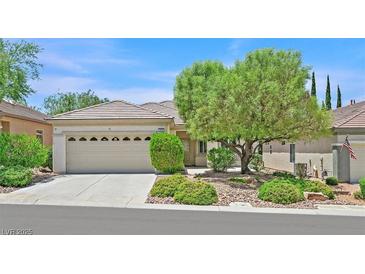 Charming single-story home with a well-manicured front yard and a two-car garage at 2839 Goldcreek St, Henderson, NV 89052