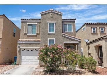 Charming two-story home featuring desert landscaping and a two car garage at 7706 Crystal Village Ln, Las Vegas, NV 89113