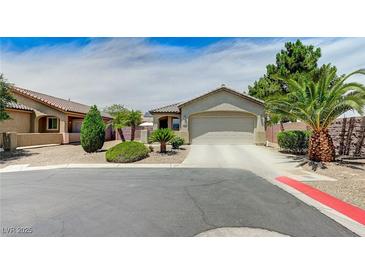 Charming single-story home featuring a two-car garage and low-maintenance desert landscaping at 3307 Forestina Ct, Las Vegas, NV 89122