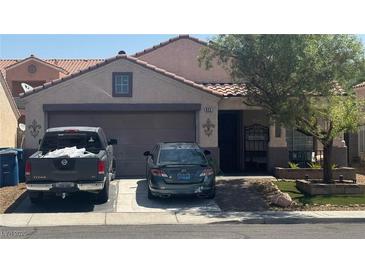 Charming single-story home featuring a well-maintained lawn and a two-car garage, located in a quiet neighborhood at 422 Rancho Del Norte Dr, North Las Vegas, NV 89031