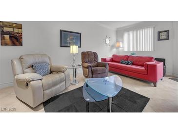 Inviting living room features stylish seating and decor, ideal for relaxation and entertaining guests at 270 E Flamingo Rd # 106, Las Vegas, NV 89169