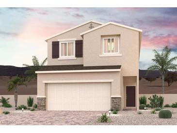 Charming two-story home with a neutral color palette, attached two car garage, and desert landscaping at 8556 W Agate Ave, Las Vegas, NV 89113