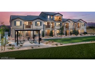 Charming townhome with attractive landscaping, manicured lawns, and a covered patio area for outdoor enjoyment at 641 Bellus Pl # Lot 149, Henderson, NV 89015