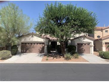 Charming single-story home with two-car garage and mature landscaping at 3328 White Bark Pine St, Las Vegas, NV 89129
