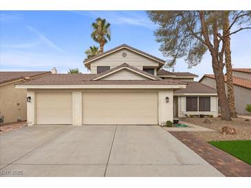 Charming two-story home with a three car garage and desert landscaping at 2344 Valleywood St, Henderson, NV 89014