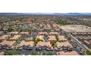 Expansive aerial view of townhomes with well-maintained landscaping and neighborhood amenities at 5855 Valley Dr # 2106, North Las Vegas, NV 89031