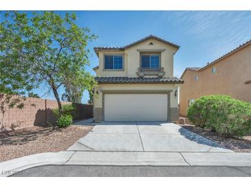 Charming two-story home featuring a well-maintained front yard and a two-car garage at 8421 Cheerful Brook Ave, Las Vegas, NV 89143