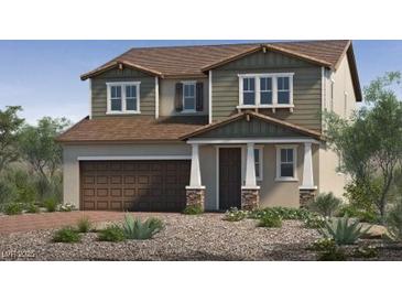 Charming two-story home with a two-car garage and low maintenance front yard at 3697 Alla Rocca Ave, Henderson, NV 89044