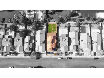 Stunning aerial view of a home showcasing its layout, landscaping, and neighborhood surroundings at 7329 Restful Springs Ct, Las Vegas, NV 89128