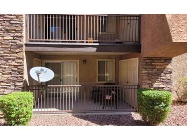 Cozy patio featuring neutral stucco and stone accents, perfect for relaxing or outdoor dining at 5295 Indian River Dr # 305, Las Vegas, NV 89103