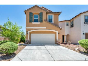Charming two-story home with a two-car garage, desert landscaping, and striking curb appeal at 3757 Via Geneva, Henderson, NV 89052