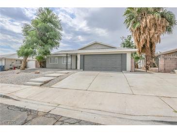 Charming single-story home with a spacious driveway and mature trees in a well-kept yard at 4269 Roanridge Ave, Las Vegas, NV 89120