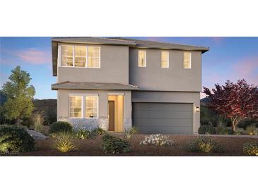 Charming two-story home with a modern design, neutral paint, and well-maintained landscaping at 10357 Scalata Ave, Las Vegas, NV 89166