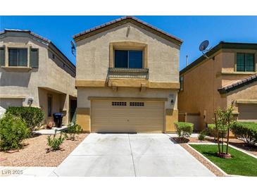 Charming two-story home featuring a two-car garage and low maintenance landscaping at 6548 Butterfly Sky St, North Las Vegas, NV 89084
