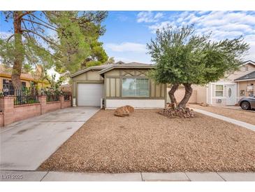 Charming single-story home featuring a well-maintained front yard and attached garage, enhancing curb appeal at 4630 Pratt Way, Las Vegas, NV 89147