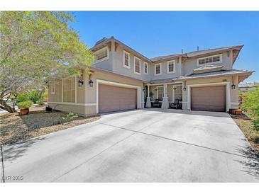 Charming two-story home featuring a spacious driveway and attached two-car garage at 5716 Breckenridge St, North Las Vegas, NV 89081