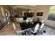 Bright dining room has a modern table and chairs at 2200 Purple Majesty Ct, Las Vegas, NV 89117