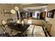 Open dining and kitchen area features modern design and ample space at 2200 Purple Majesty Ct, Las Vegas, NV 89117