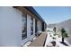 Modern home with sleek lines, large windows, and a desert landscaped walkway leading to the entrance at 652 Dragon Peak, Henderson, NV 89012
