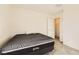 A bedroom featuring neutral carpet, a window, and a closet at 2705 Cava Tirreni St, Henderson, NV 89044