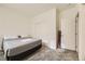 Bedroom with plush carpet, a spacious closet with sliding doors, and convenient access to the hallway at 2705 Cava Tirreni St, Henderson, NV 89044