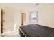 A bedroom featuring neutral carpet, a window, and a closet at 2705 Cava Tirreni St, Henderson, NV 89044