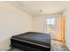 A bedroom featuring neutral carpet, a window, and a closet at 2705 Cava Tirreni St, Henderson, NV 89044