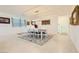 Bright, modern dining room features a large table perfect for gatherings at 2705 Cava Tirreni St, Henderson, NV 89044