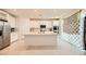 Spacious kitchen with white cabinetry, stainless steel appliances, and a center island at 2705 Cava Tirreni St, Henderson, NV 89044