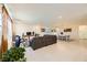 Spacious living room with dining area, neutral decor, and lots of light at 2705 Cava Tirreni St, Henderson, NV 89044